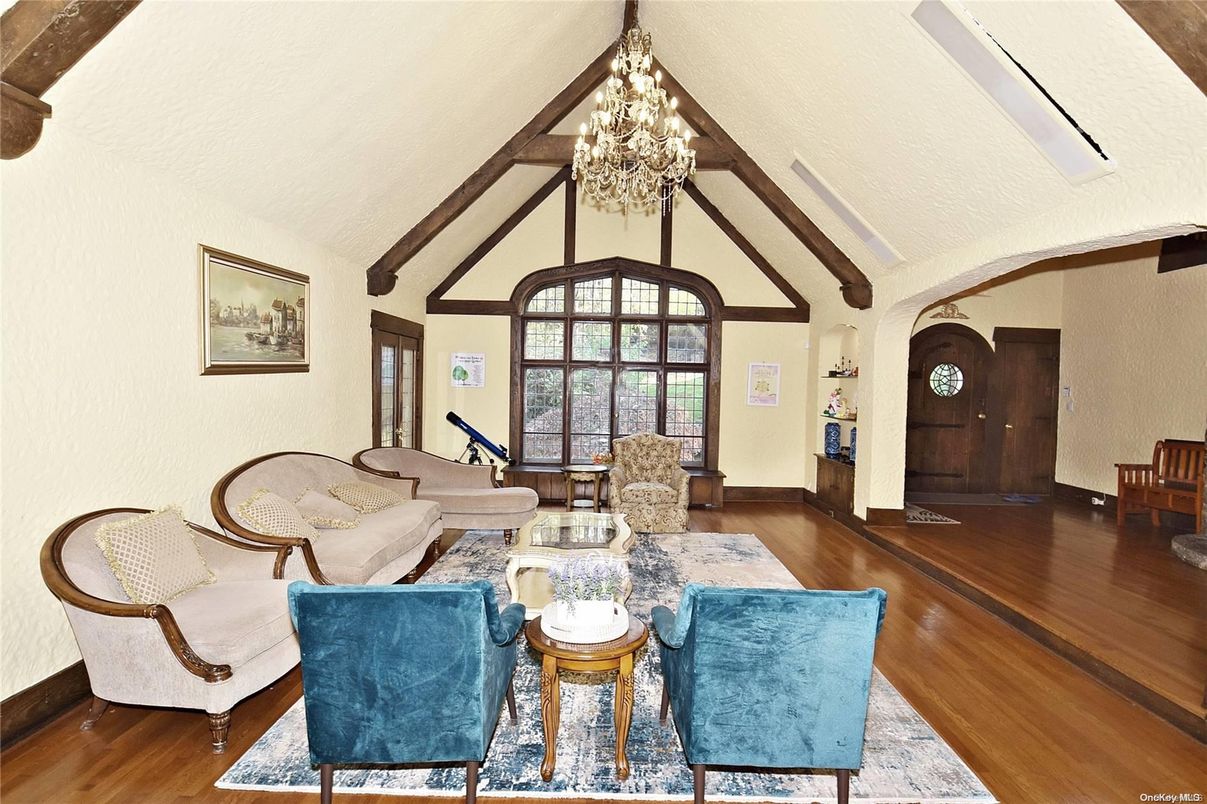 Chandelier, Dining room, Interior, Living room, Piano, Wooden Beams, Wood Texture Flooring