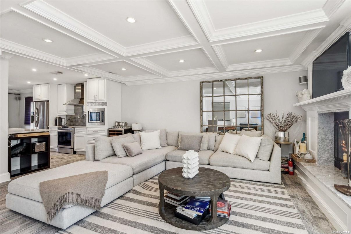 Fireplace, Interior, Kitchen, Living room, Recessed Lighting, Stainless Steel Appliances, Wood Texture Flooring