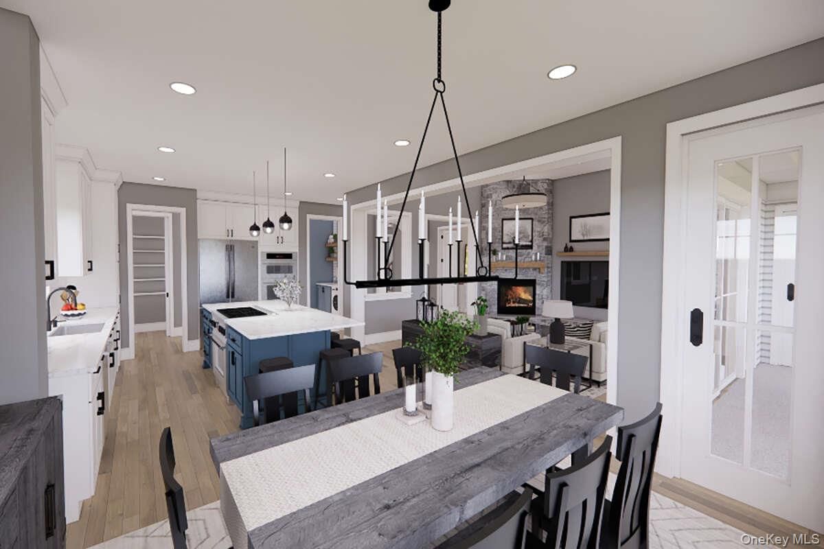 Dining room, Fireplace, Interior, Kitchen, Living room, Pendant Lights, Recessed Lighting, Stainless Steel Appliances, Wood Texture Flooring