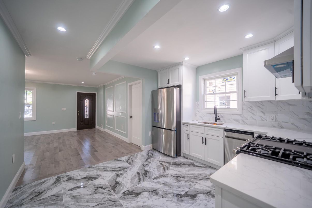 Interior, Kitchen, Marble, Recessed Lighting, Stainless Steel Appliances, Wood Texture Flooring