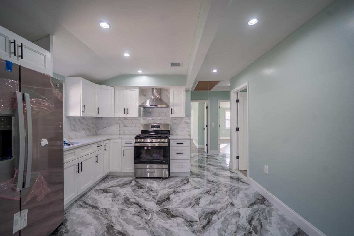 Interior, Kitchen, Marble, Marble Walls, Recessed Lighting, Stainless Steel Appliances