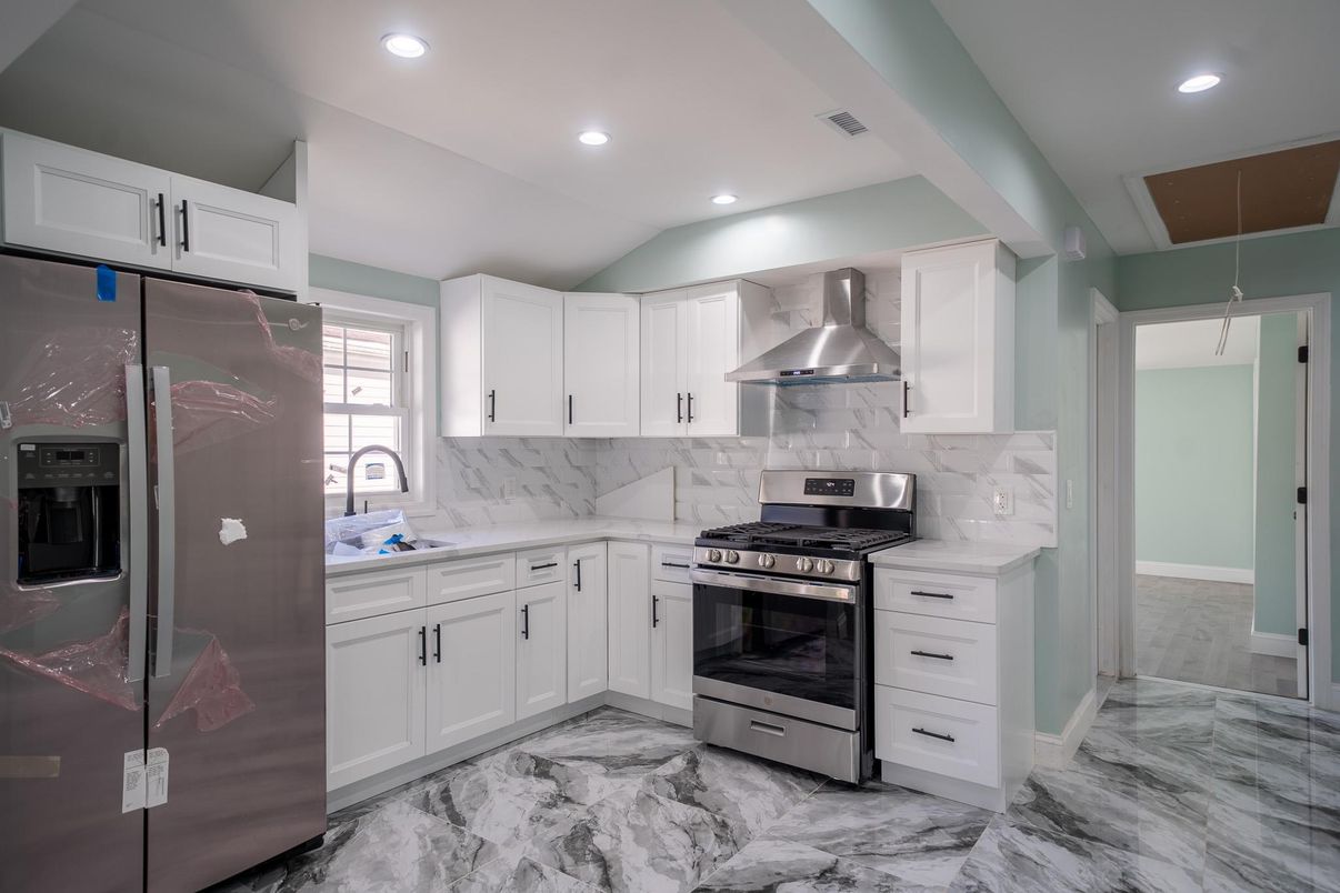 Interior, Kitchen, Marble, Marble Walls, Recessed Lighting, Stainless Steel Appliances