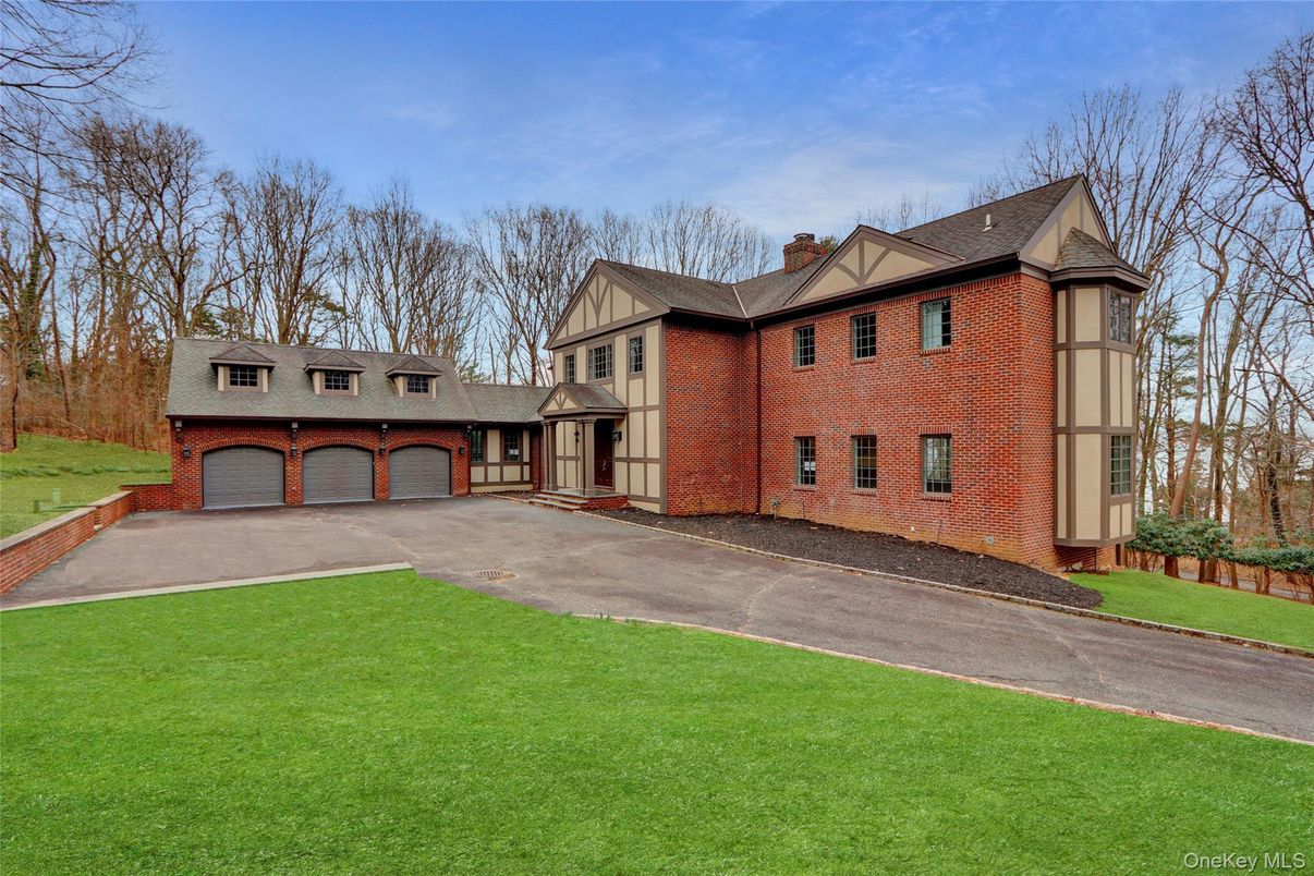 Attached, Backyard, Exterior, Facade, Brick Facade, Tudor Revival