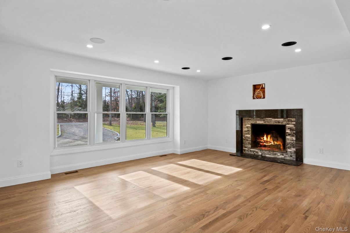 Empty room, Fireplace, Interior, Recessed Lighting, Wood Texture Flooring