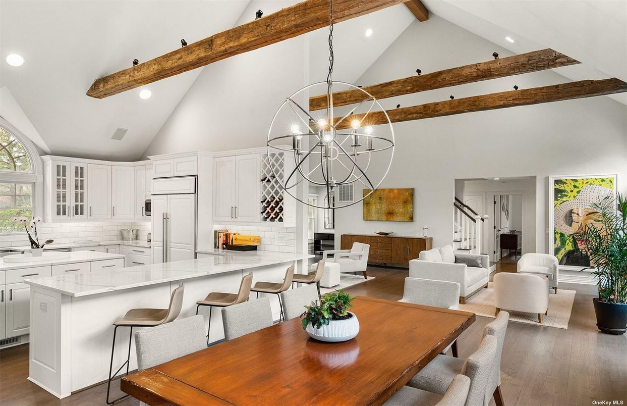 Chandelier, Dining room, Interior, Kitchen, Living room, Pendant Lights, Recessed Lighting, Stainless Steel Appliances, Wooden Beams, Wood Texture Flooring