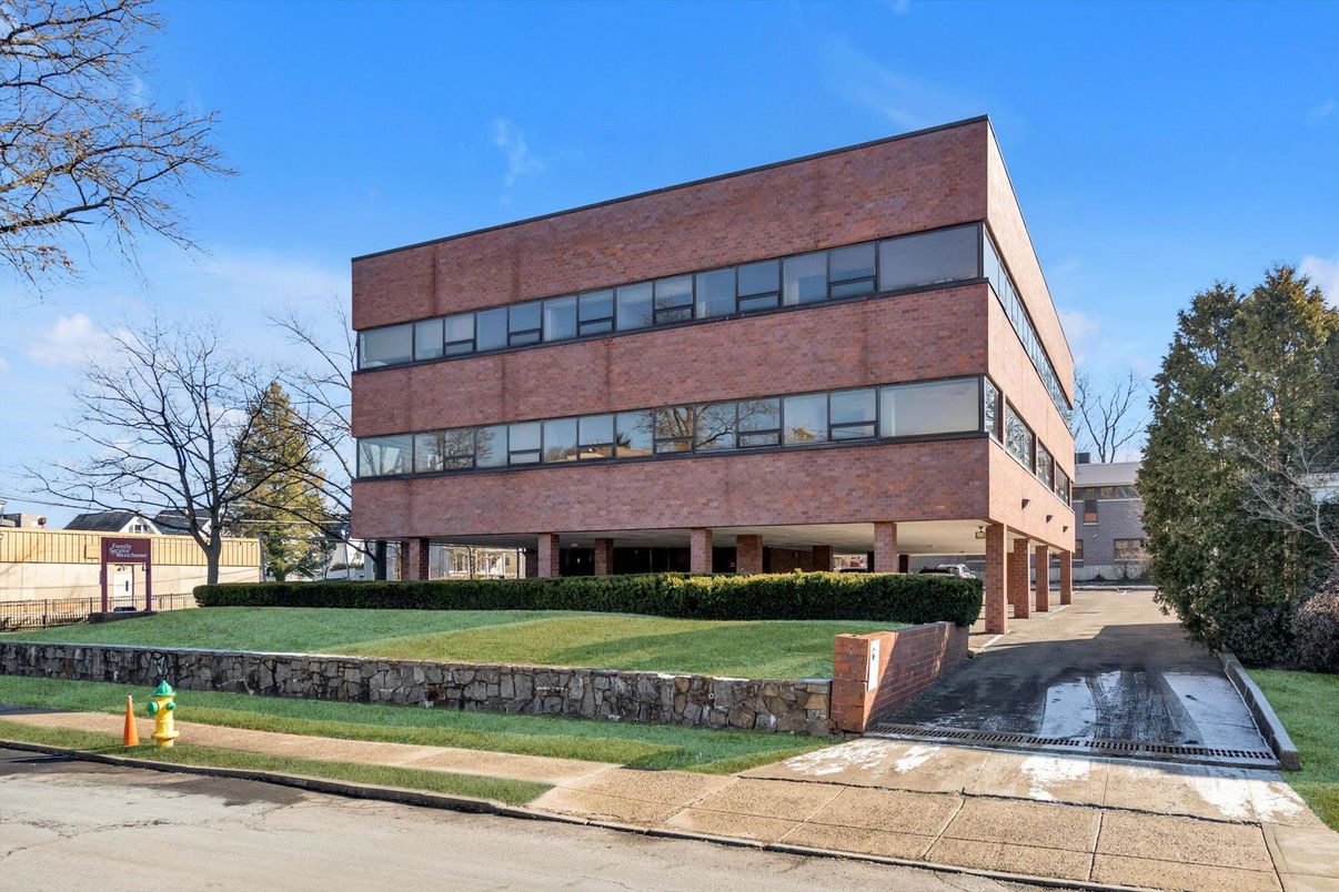 Exterior, Facade, Brick Facade, Condo Building