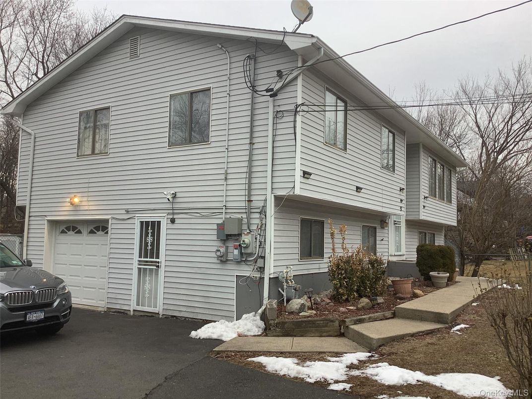 Attached, Exterior, Facade, Raised Ranch