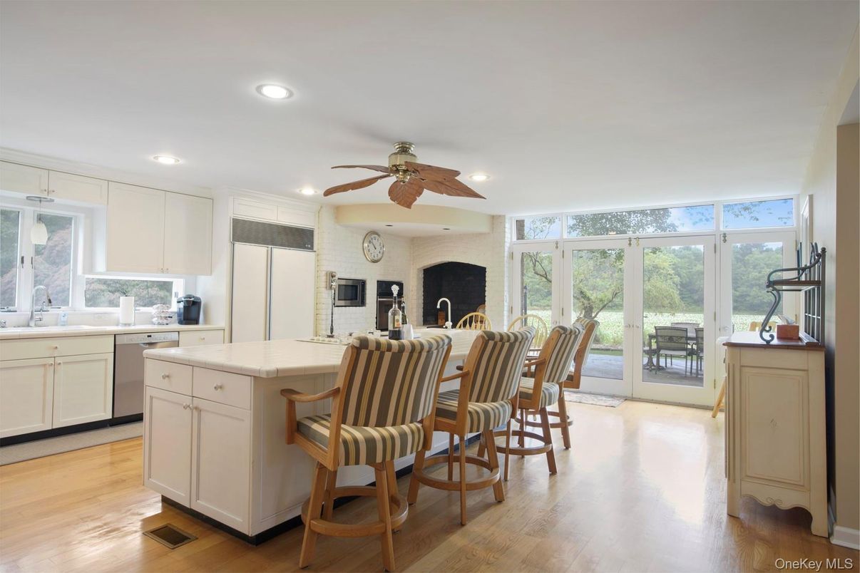 Fireplace, Interior, Kitchen, Recessed Lighting, Wood Texture Flooring