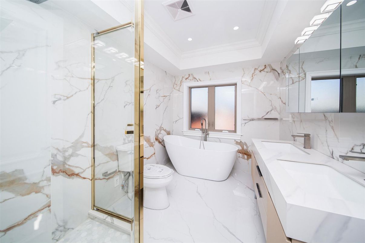 Bathroom, Dual Sink Vanities, Free Standing Baths, Glass Shower, Interior, Marble, Marble Walls, Recessed Lighting