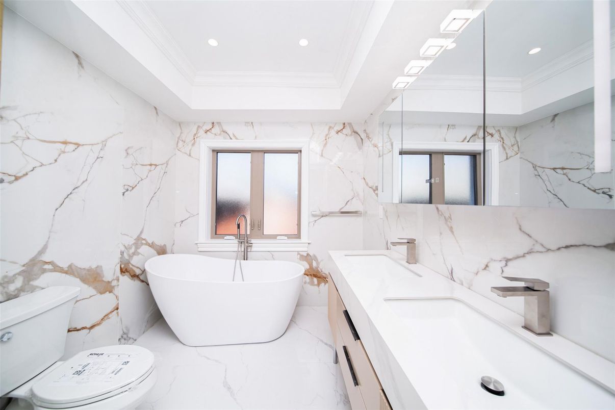 Bathroom, Dual Sink Vanities, Free Standing Baths, Interior, Marble, Marble Walls, Recessed Lighting