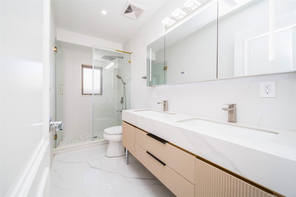 Bathroom, Dual Sink Vanities, Glass Shower, Interior, Marble, Marble Walls, Recessed Lighting