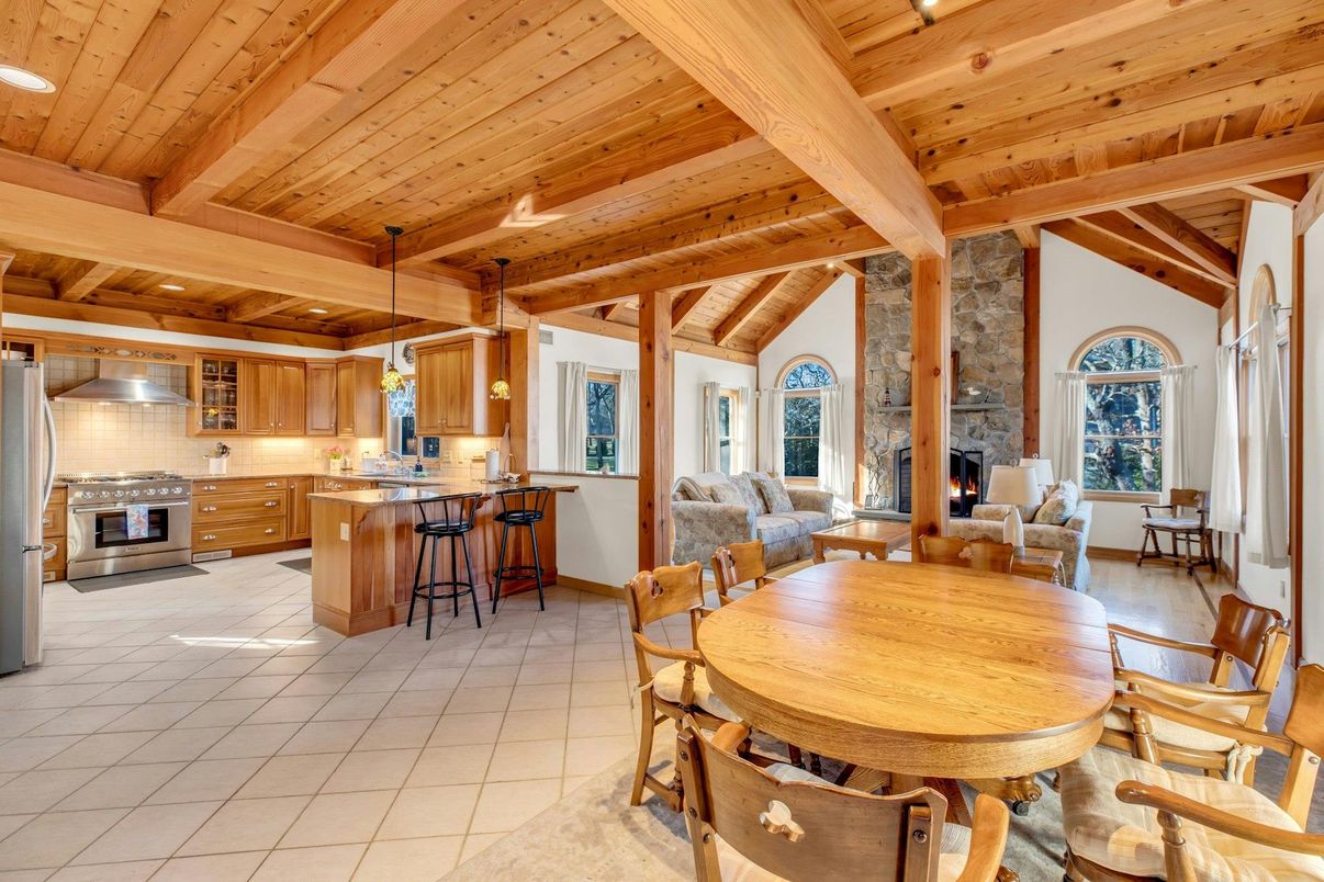Dining room, Fireplace, Interior, Kitchen, Living room, Pendant Lights, Stainless Steel Appliances, Stone Walls, Wooden Beams, Wooden Ceilings