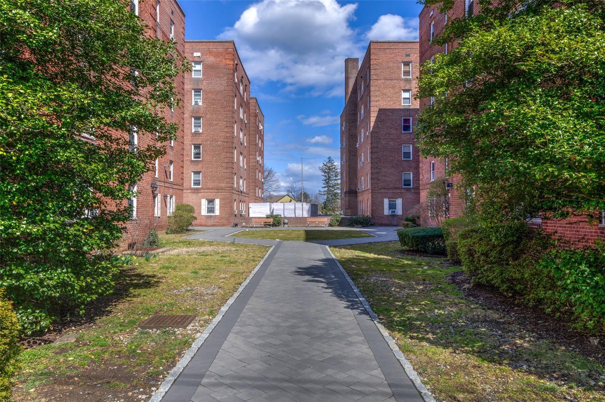 Exterior, Facade, Brick Facade, Condo Building