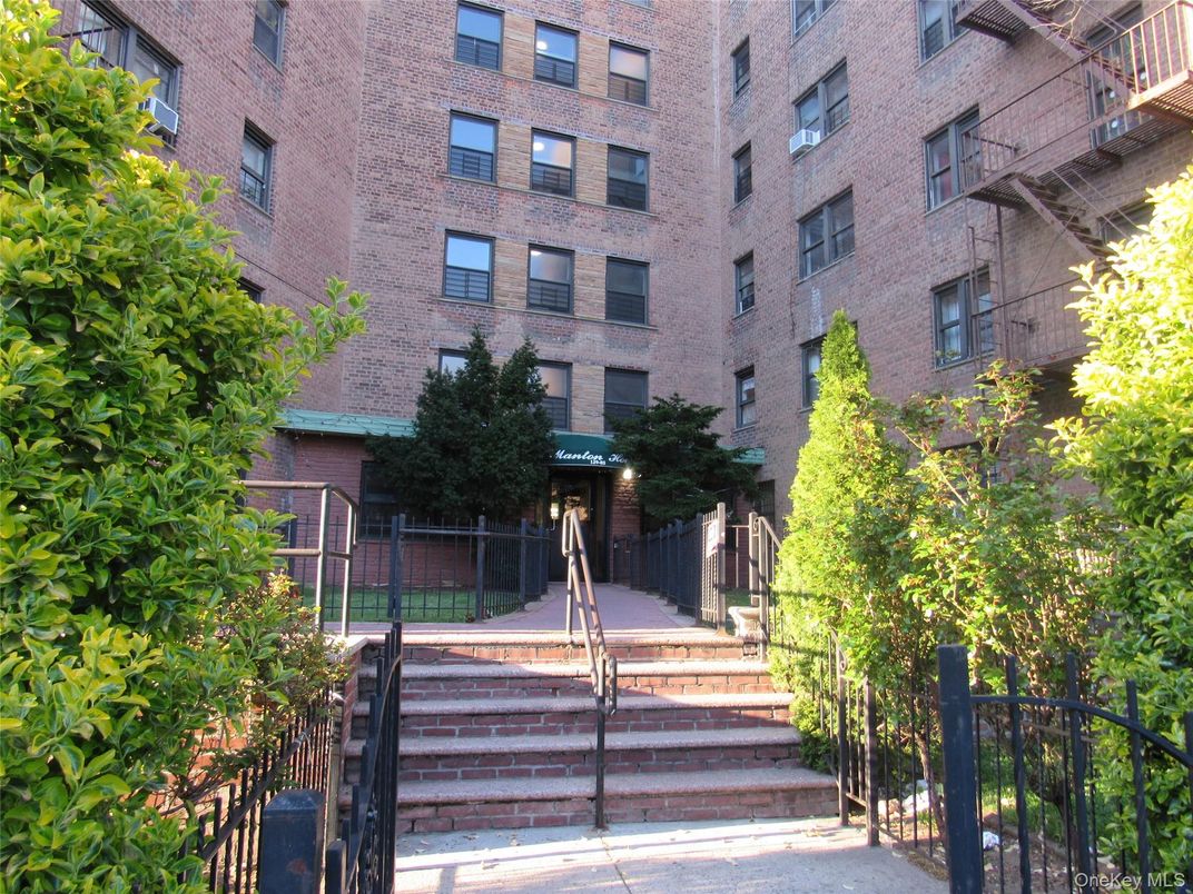 Exterior, Facade, Brick Facade, Condo Building