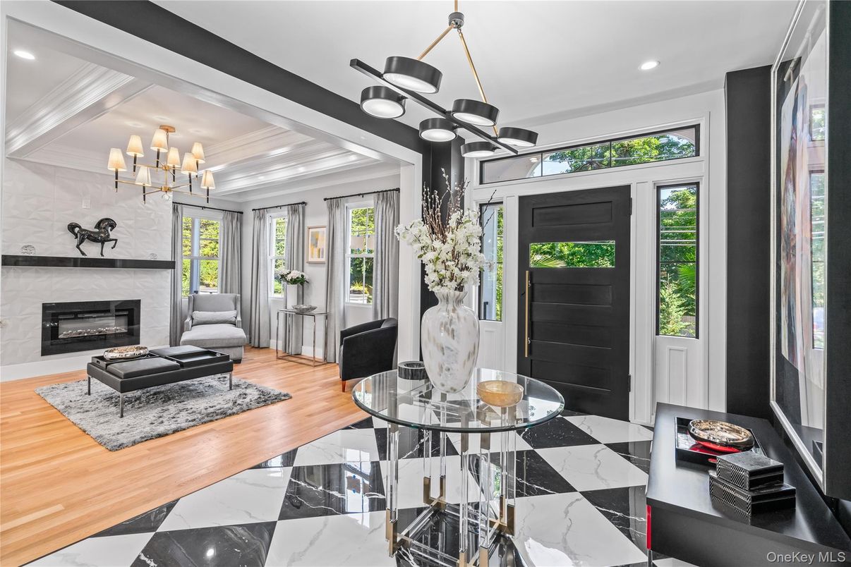 Chandelier, Fireplace, Interior, Living room, Marble, Pendant Lights, Recessed Lighting, Wood Texture Flooring