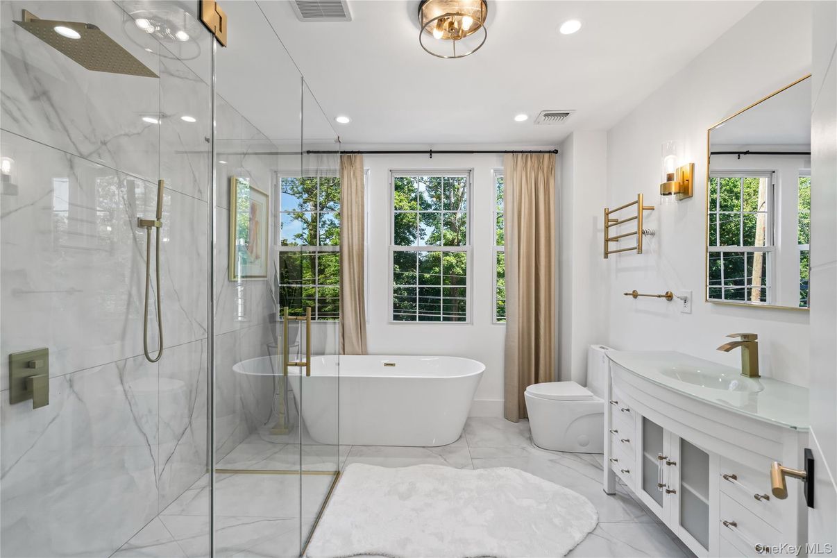 Bathroom, Free Standing Baths, Glass Shower, Interior, Marble, Marble Walls, Recessed Lighting