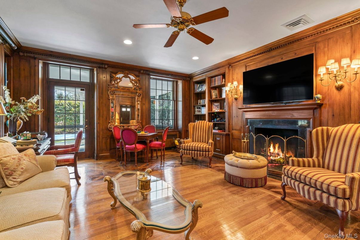 Dining room, Fireplace, Interior, Living room, Recessed Lighting, Wood Texture Flooring, Wooden Walls