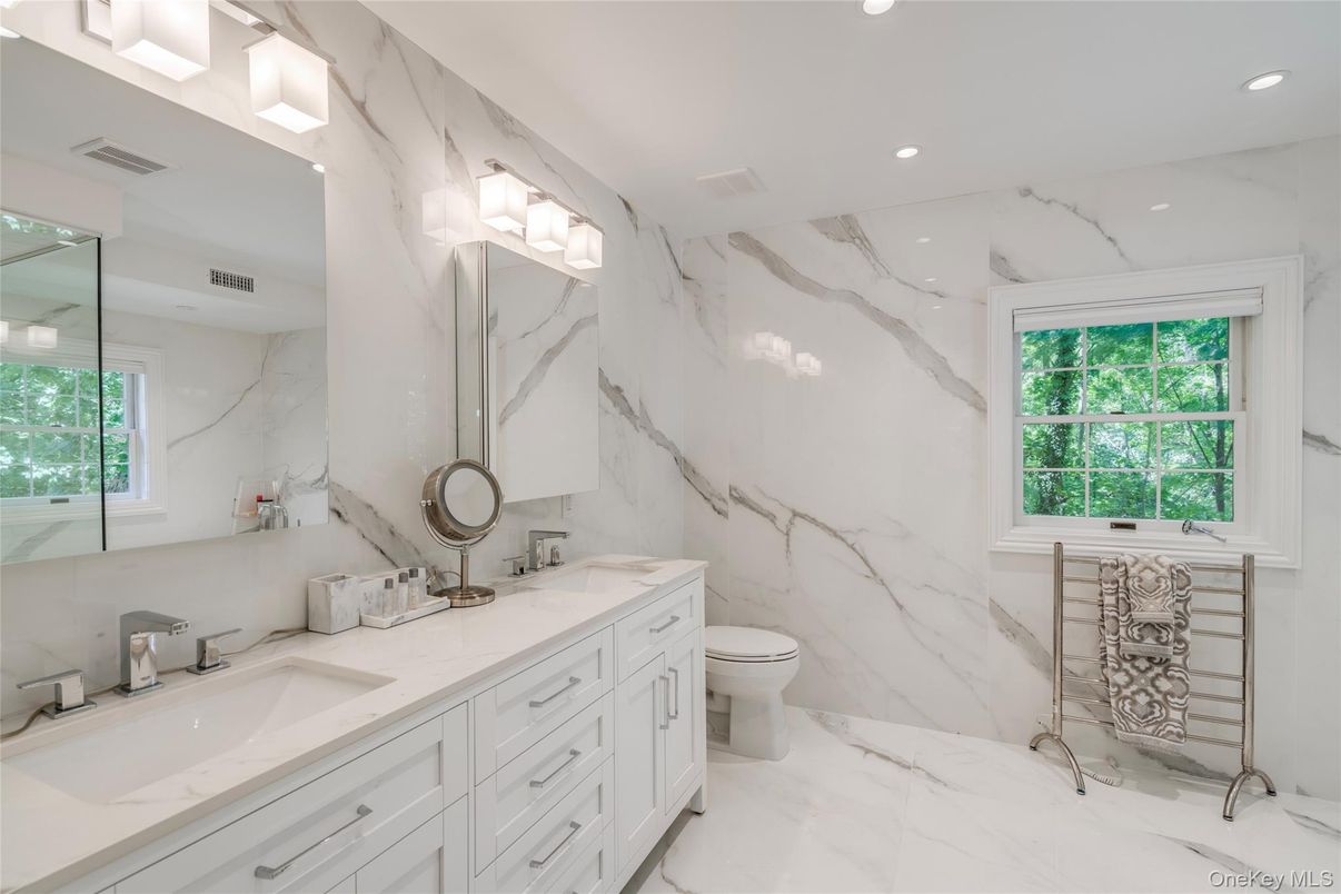 Bathroom, Dual Sink Vanities, Interior, Marble, Marble Walls, Recessed Lighting