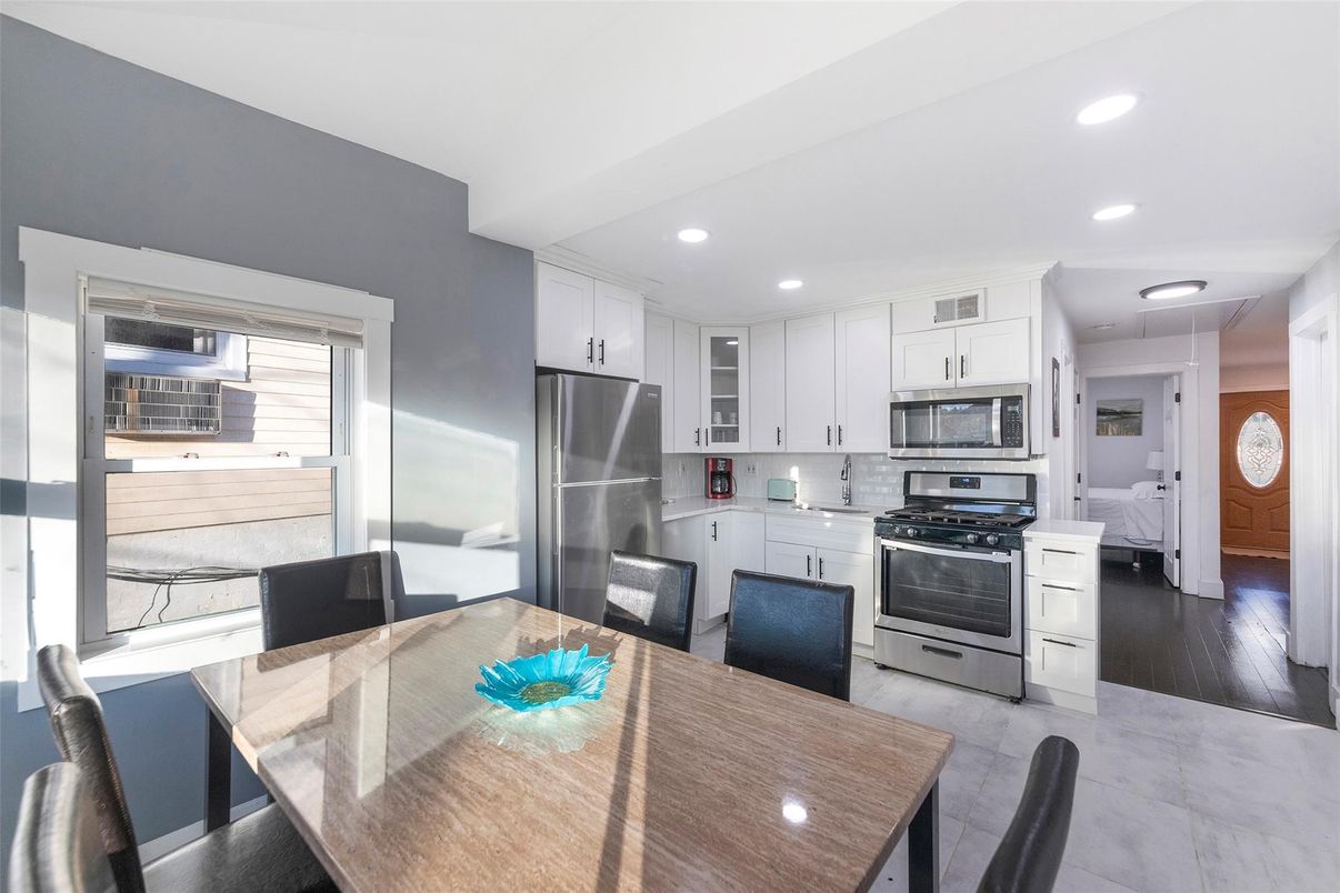 Dining room, Interior, Kitchen, Recessed Lighting, Stainless Steel Appliances, Wood Texture Flooring