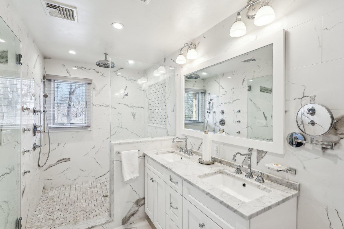 Bathroom, Dual Sink Vanities, Glass Shower, Interior, Marble, Marble Walls, Recessed Lighting