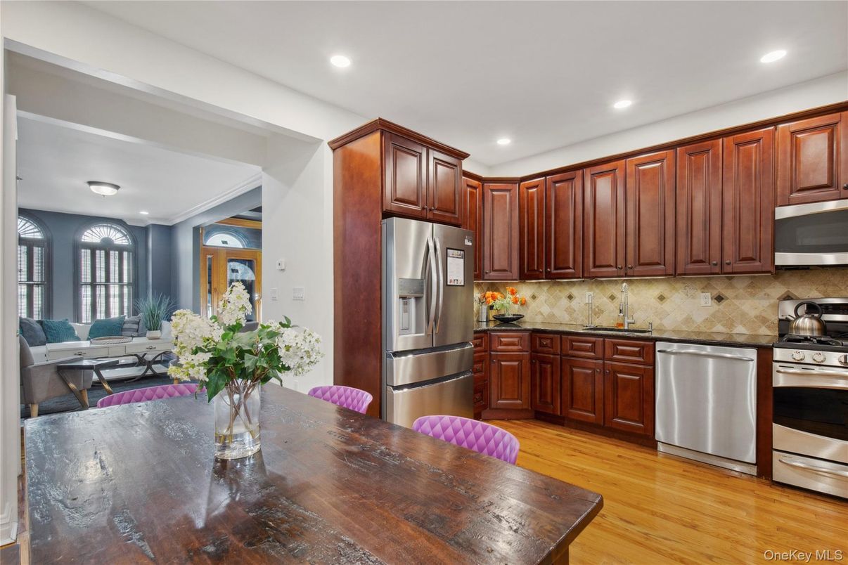 Dining room, Interior, Kitchen, Recessed Lighting, Stainless Steel Appliances, Wood Texture Flooring