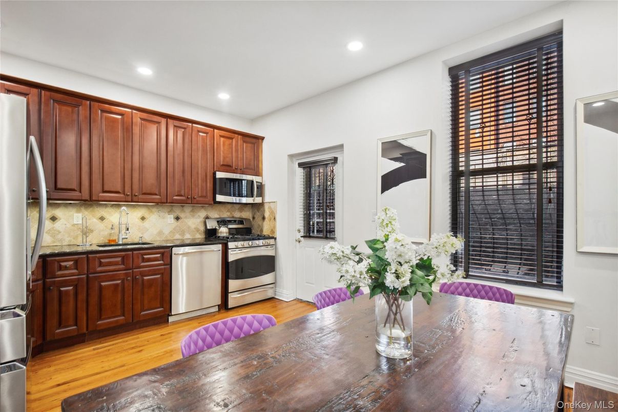 Dining room, Interior, Kitchen, Recessed Lighting, Stainless Steel Appliances, Wood Texture Flooring