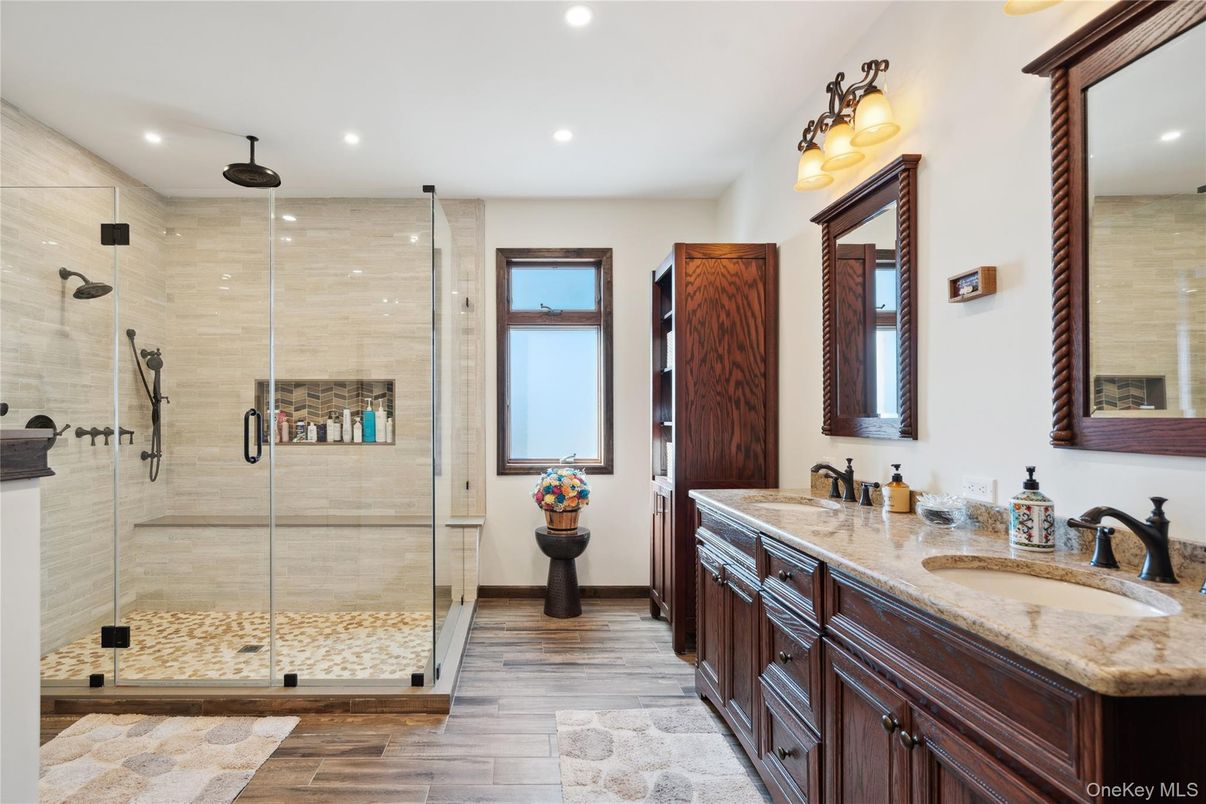 Bathroom, Dual Sink Vanities, Glass Shower, Interior, Recessed Lighting, Wood Texture Flooring