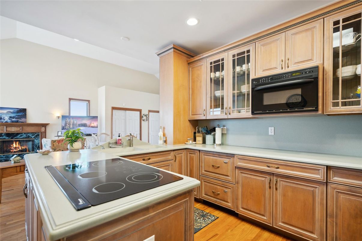 Fireplace, Interior, Kitchen, Recessed Lighting, Wood Texture Flooring