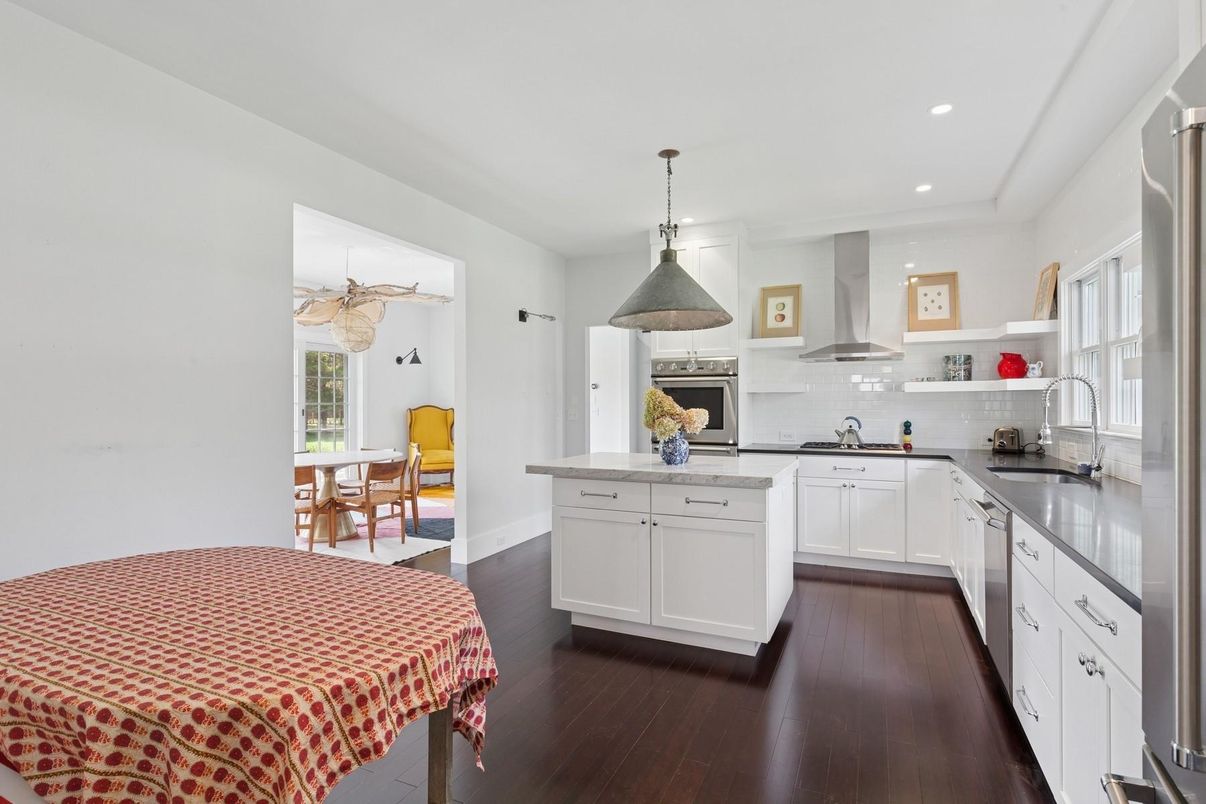 Dining room, Interior, Kitchen, Pendant Lights, Recessed Lighting, Stainless Steel Appliances, Wood Texture Flooring