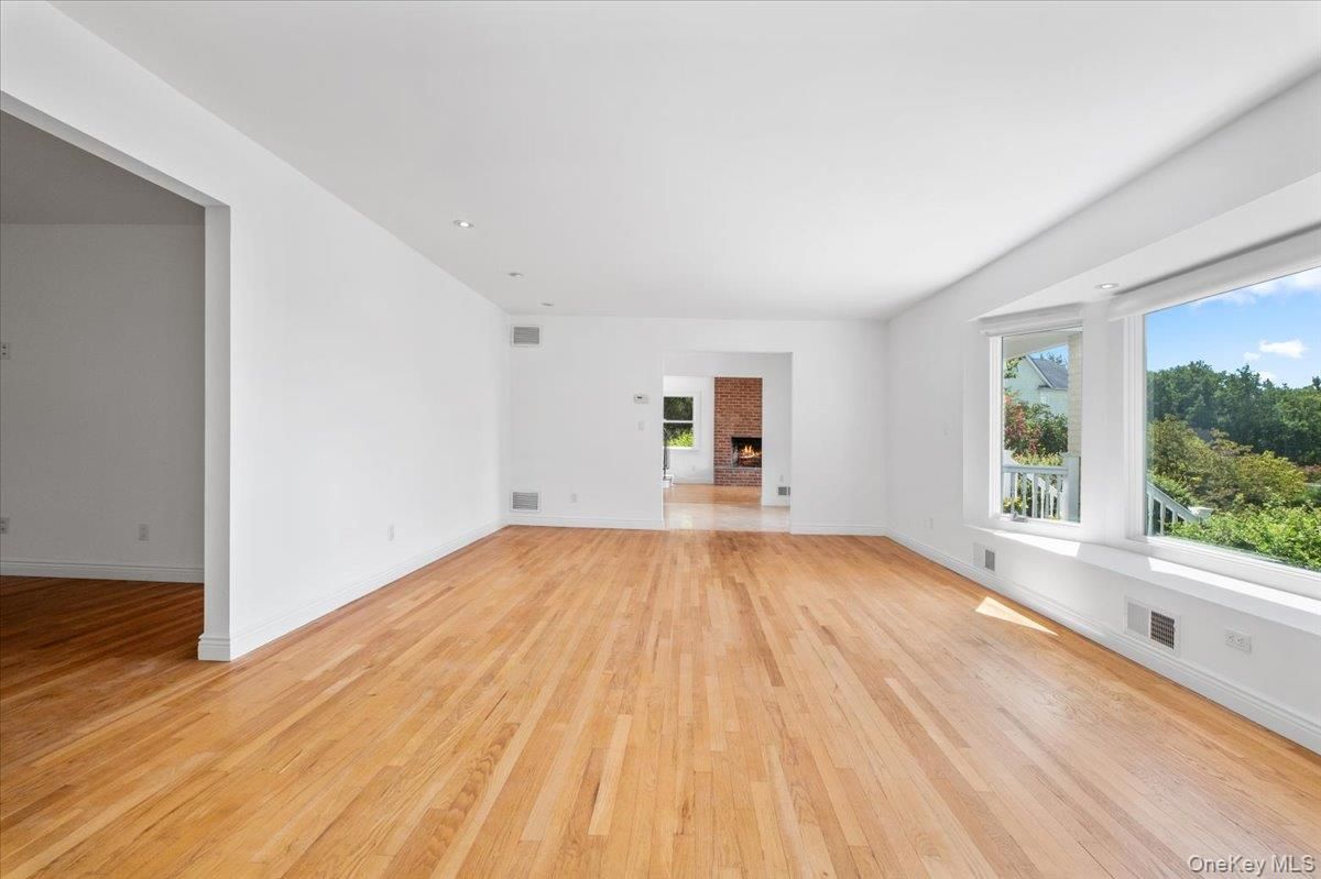 Empty room, Fireplace, Interior, Recessed Lighting, Wood Texture Flooring