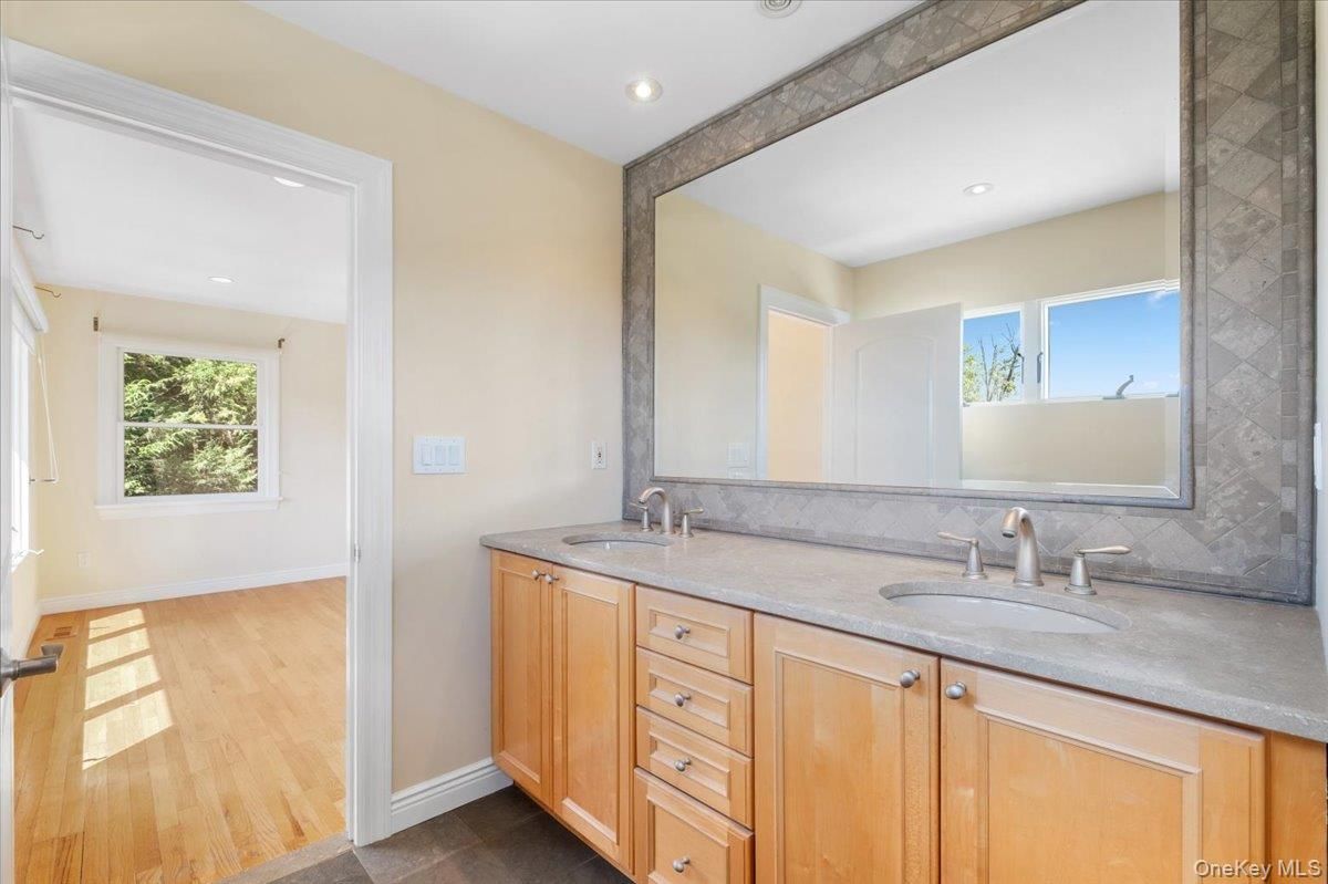Bathroom, Dual Sink Vanities, Interior, Recessed Lighting, Wood Texture Flooring
