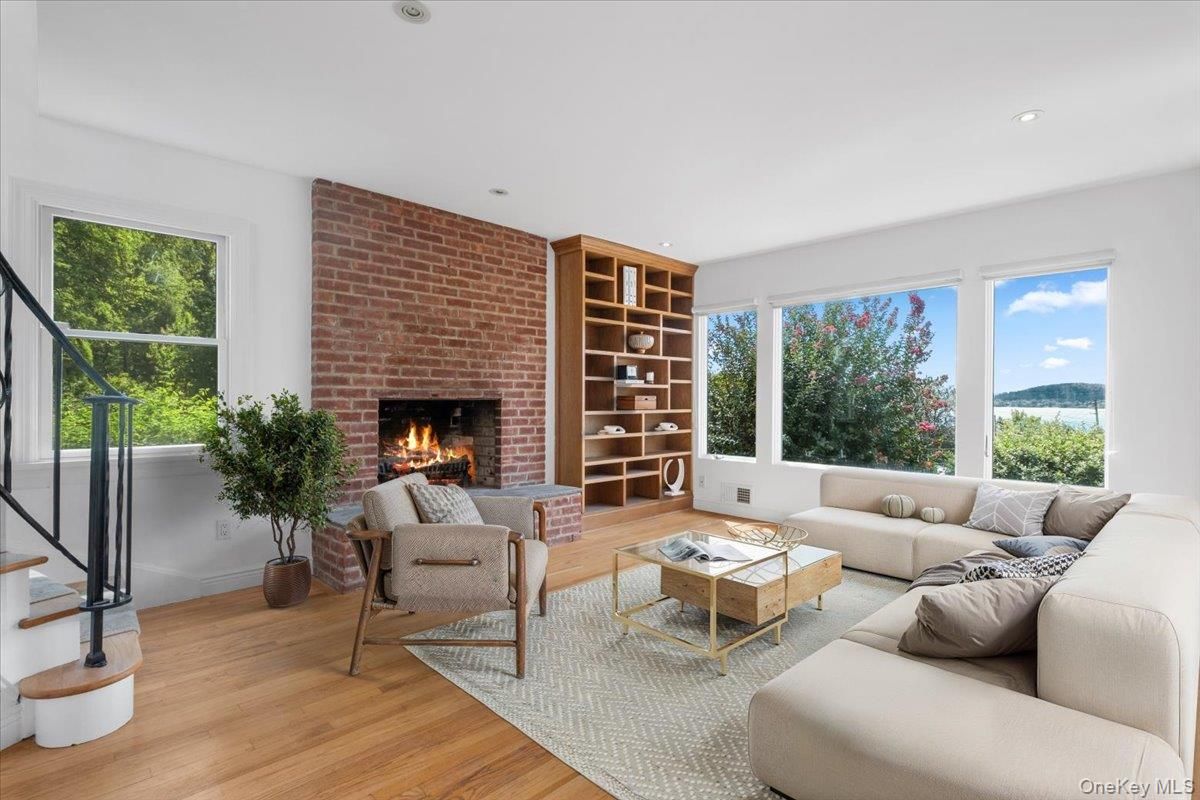 Fireplace, Interior, Living room, Recessed Lighting, Stone Walls, Wood Texture Flooring