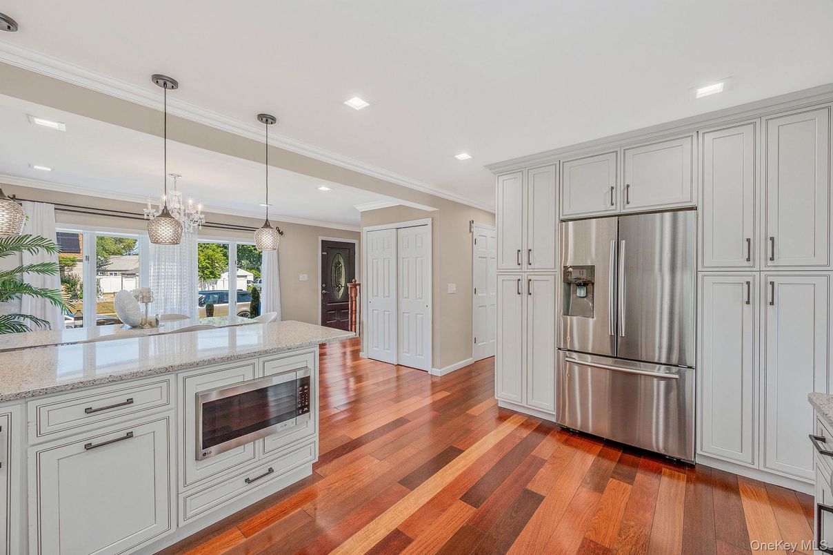 Chandelier, Interior, Kitchen, Pendant Lights, Recessed Lighting, Stainless Steel Appliances, Wood Texture Flooring
