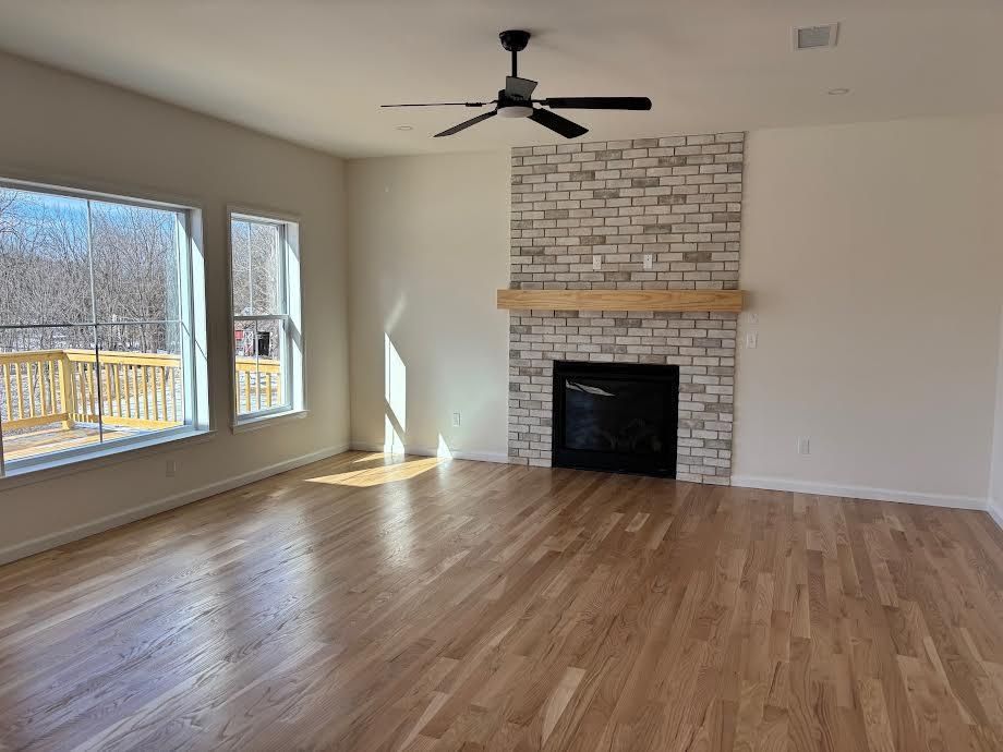 Empty room, Fireplace, Interior, Stone Walls, Wood Texture Flooring