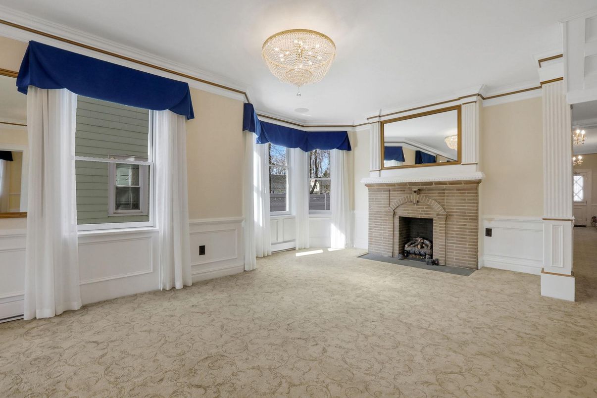 Chandelier, Empty room, Fireplace, Interior