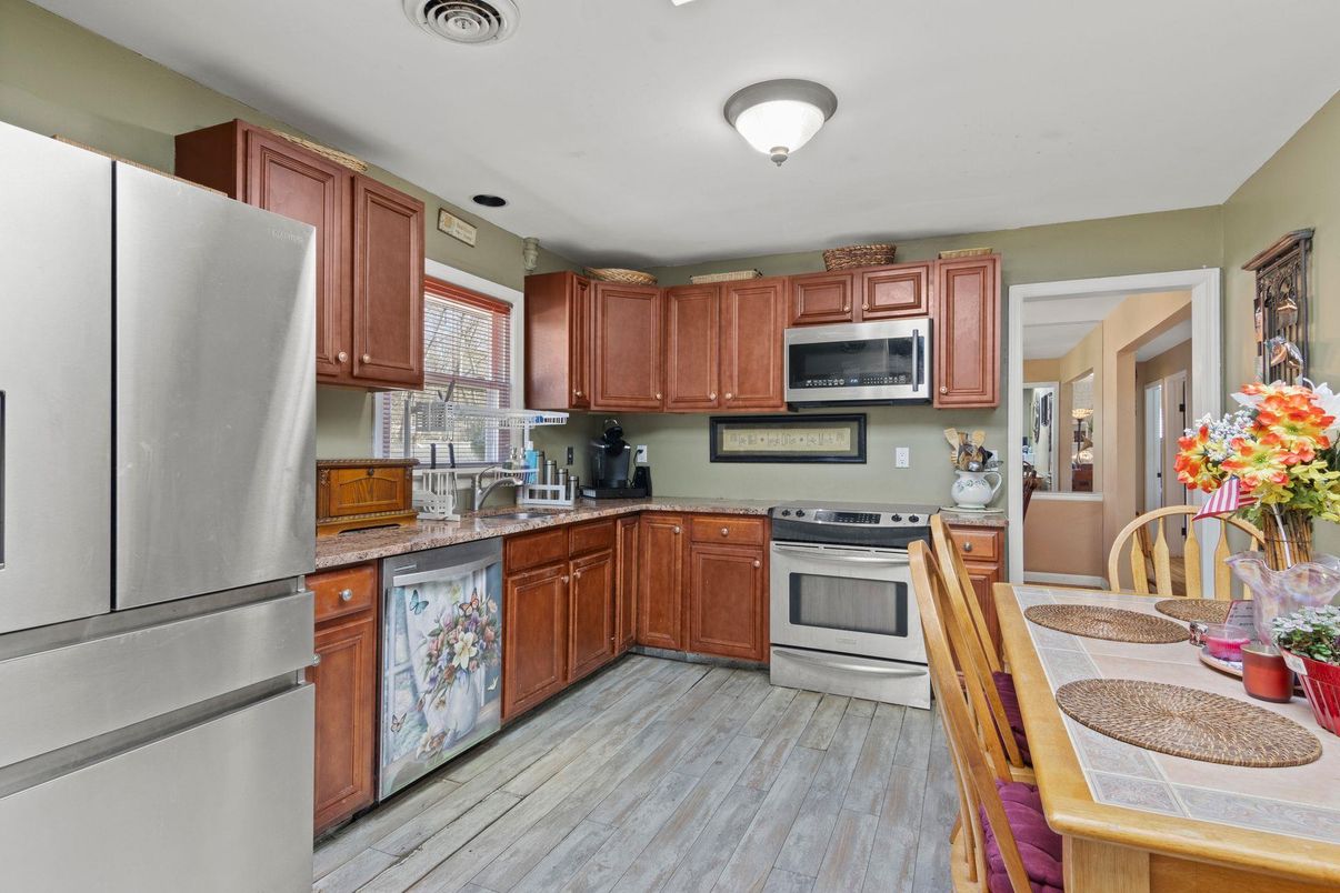 Interior, Kitchen, Stainless Steel Appliances, Tile Countertops, Wood Texture Flooring