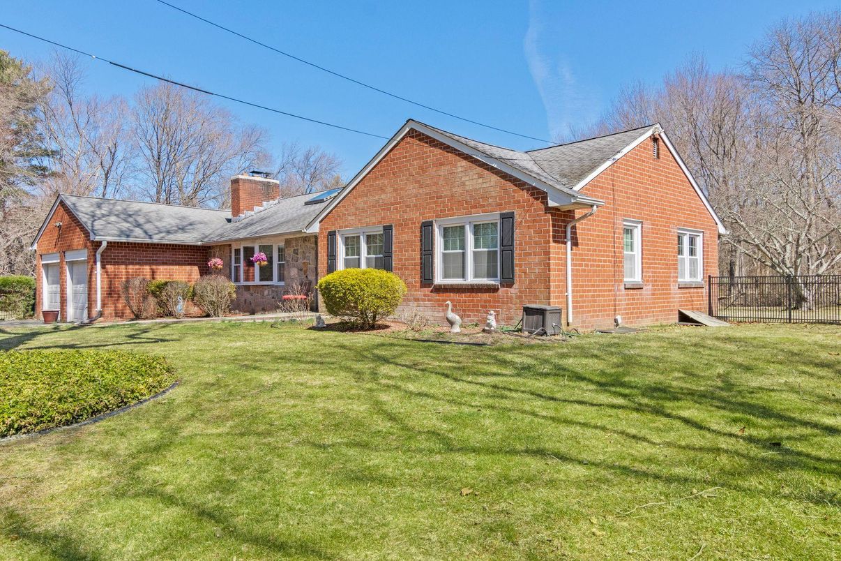 Attached, Backyard, Exterior, Facade, Brick Facade, Brick Traditional