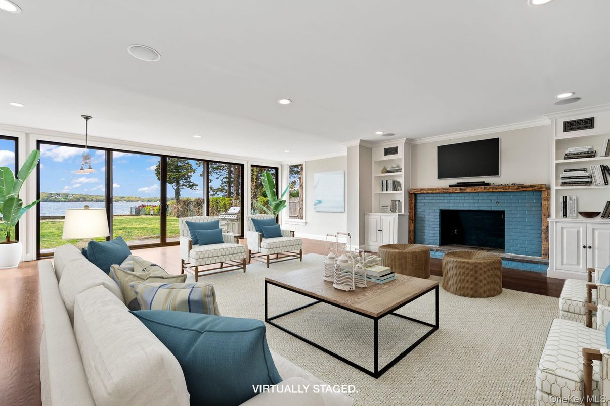 Fireplace, Interior, Living room, Recessed Lighting, Water, Wood Texture Flooring