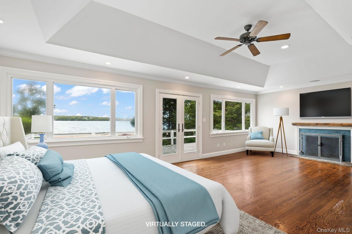 Bedroom, Fireplace, Interior, Recessed Lighting, Water, Wood Texture Flooring
