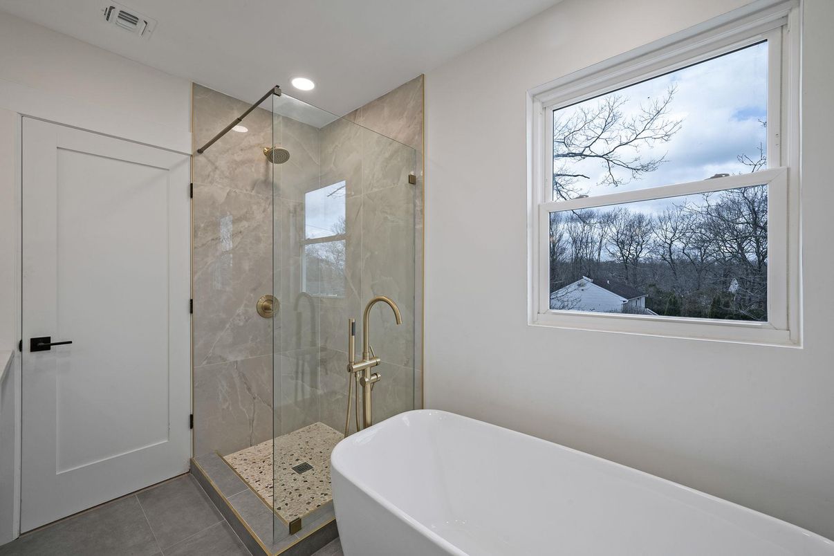 Bathroom, Free Standing Baths, Glass Shower, Interior, Marble Walls, Recessed Lighting