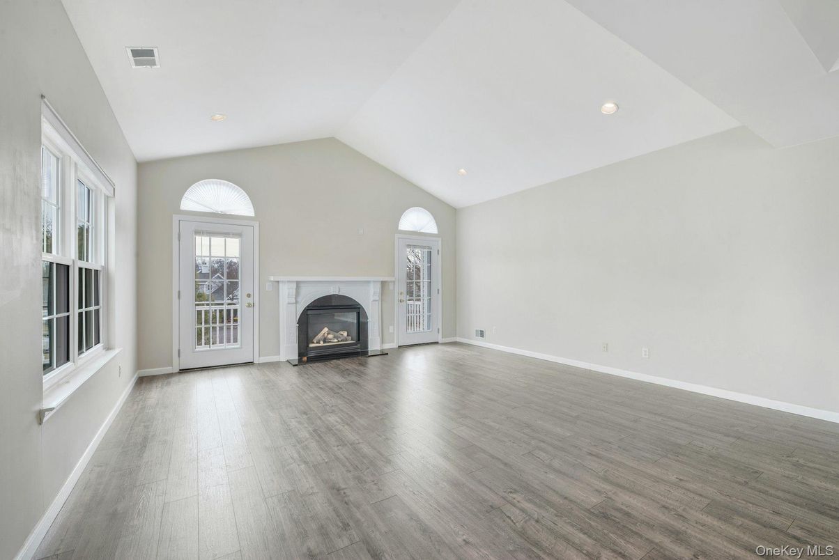 Empty room, Fireplace, Interior, Recessed Lighting, Wood Texture Flooring