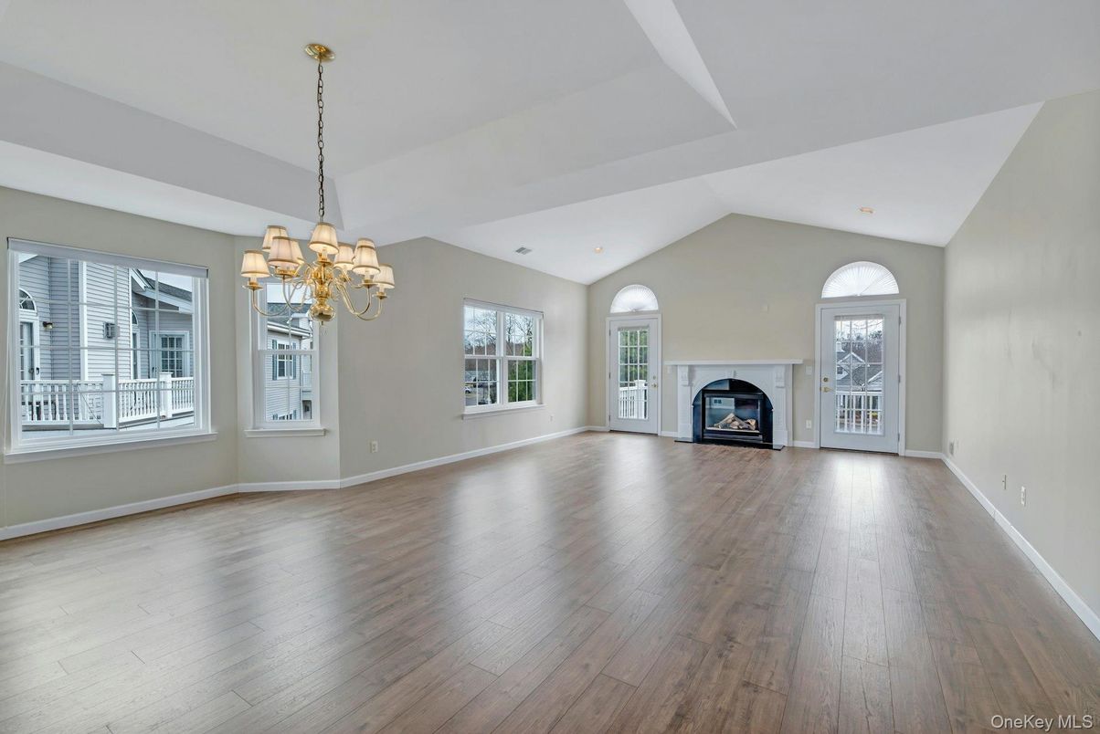 Chandelier, Empty room, Fireplace, Interior, Wood Texture Flooring