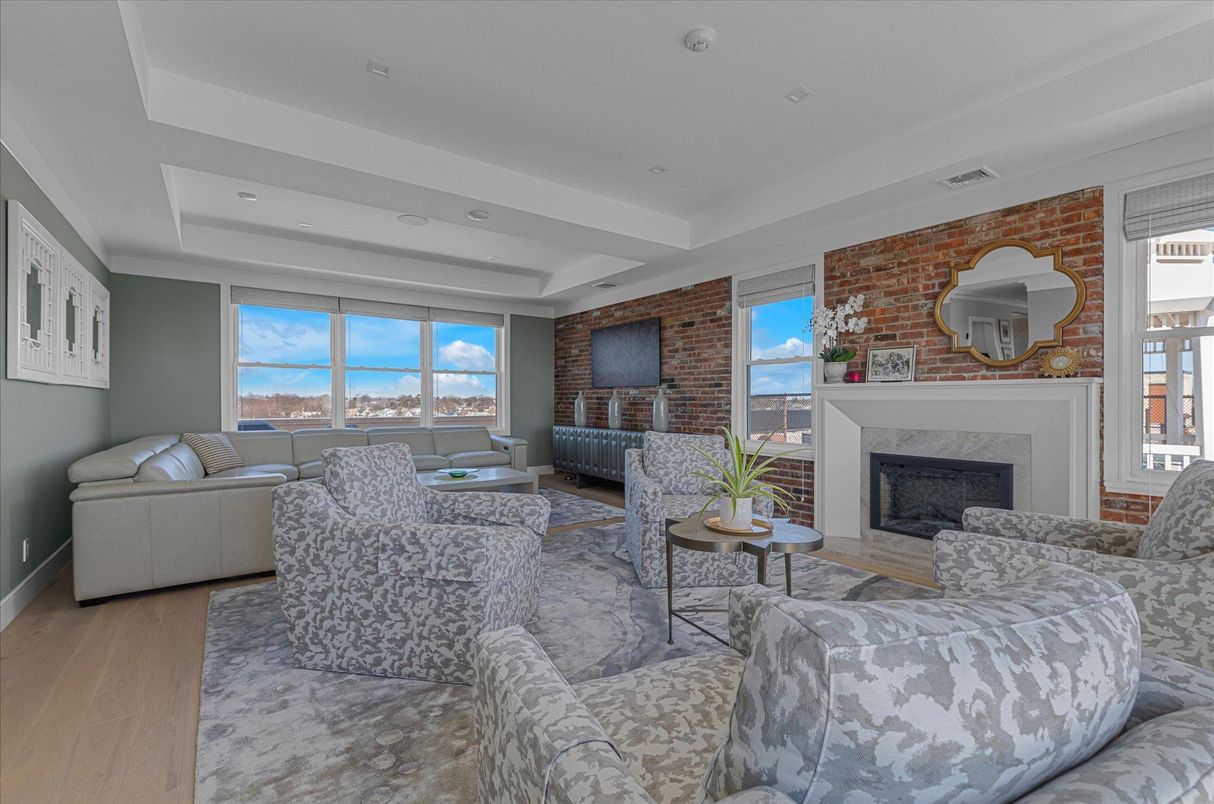 Fireplace, Interior, Living room, Recessed Lighting, Stone Walls, Wood Texture Flooring