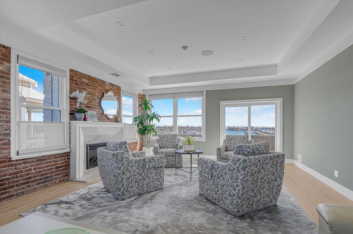 Fireplace, Interior, Living room, Recessed Lighting, Stone Walls, Wood Texture Flooring