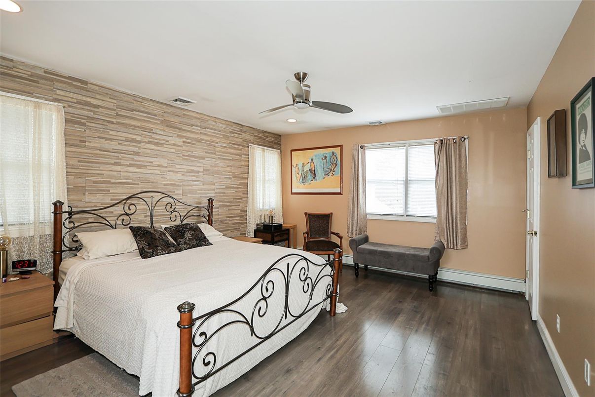 Bedroom, Fireplace, Interior, Recessed Lighting, Wood Texture Flooring, Wooden Walls