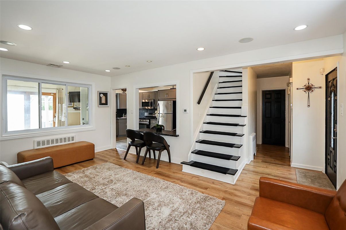 Dining room, Interior, Kitchen, Living room, Recessed Lighting, Stainless Steel Appliances, Wood Texture Flooring