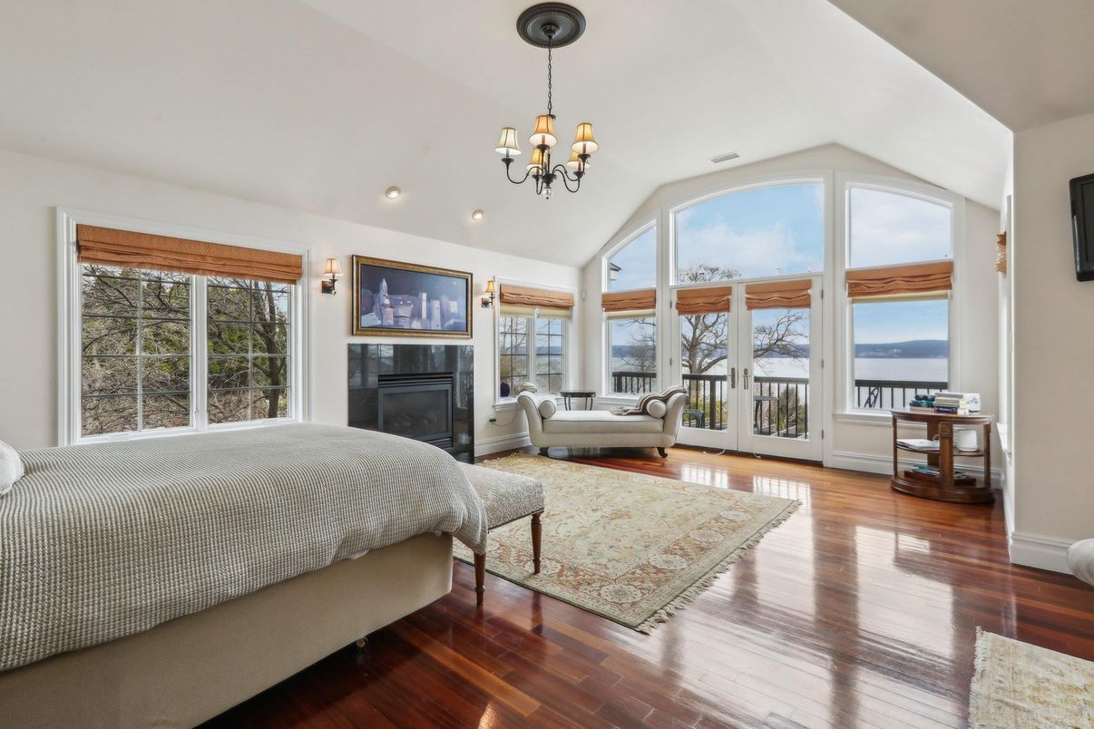 Bedroom, Chandelier, Fireplace, Interior, Water, Wood Texture Flooring