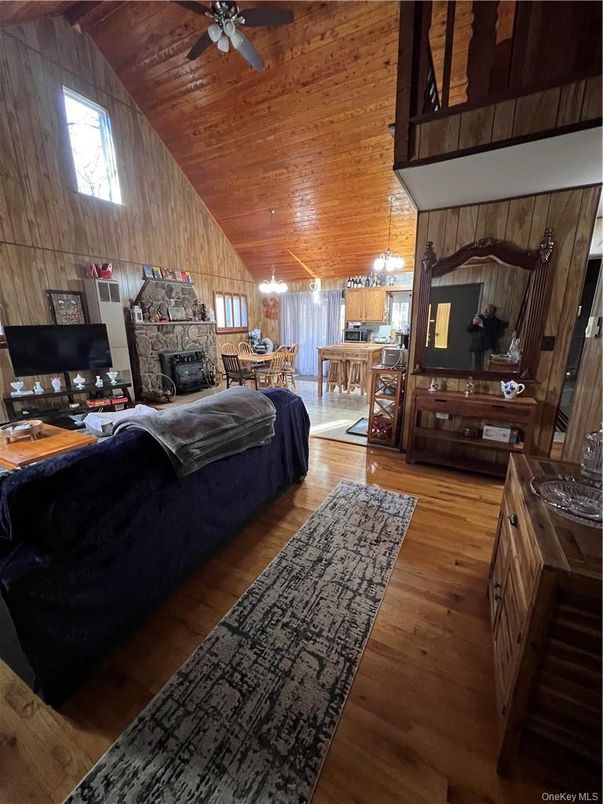 Chandelier, Dining room, Fireplace, Interior, Kitchen, Pendant Lights, Wooden Ceilings, Wood Texture Flooring, Wooden Walls