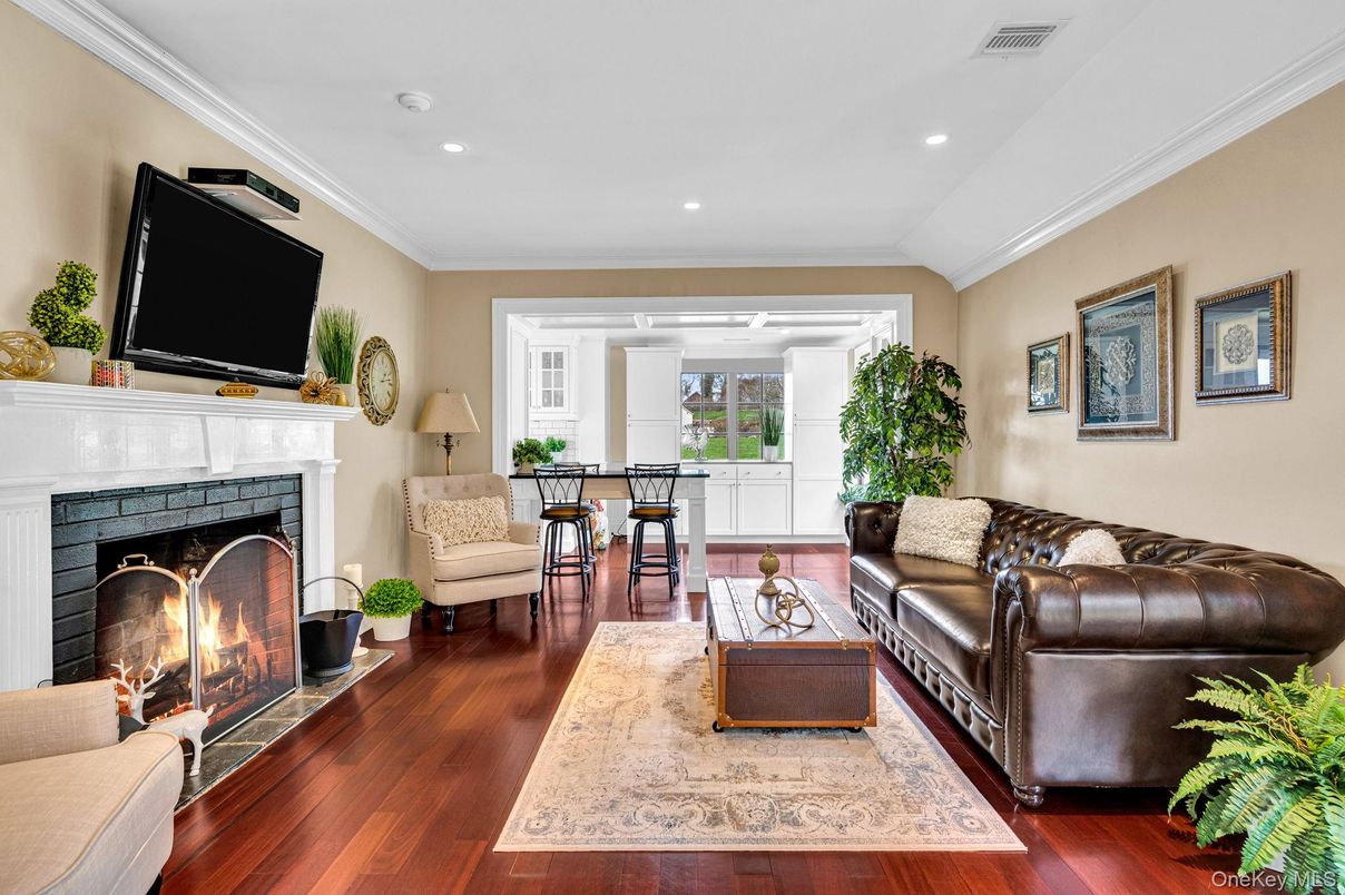 Fireplace, Interior, Living room, Recessed Lighting, Wood Texture Flooring