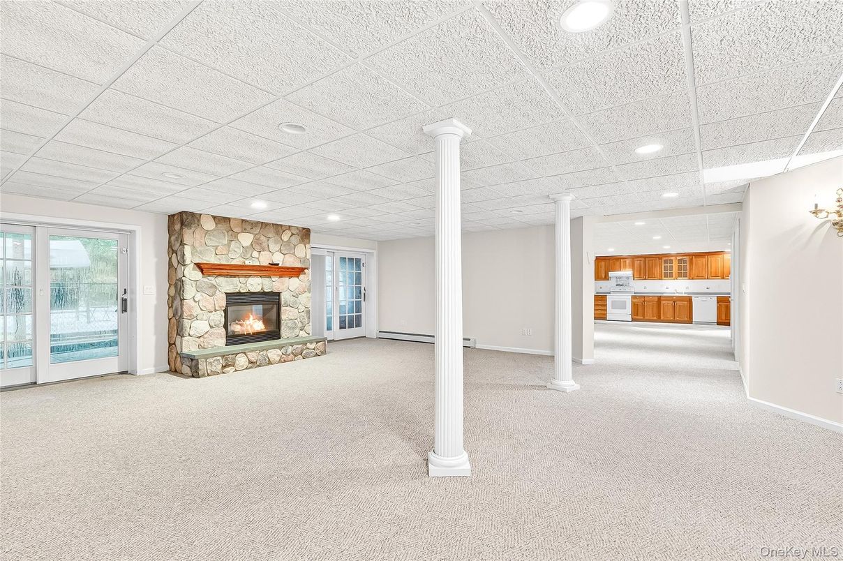 Empty room, Fireplace, Interior, Kitchen, Recessed Lighting, Stone Walls